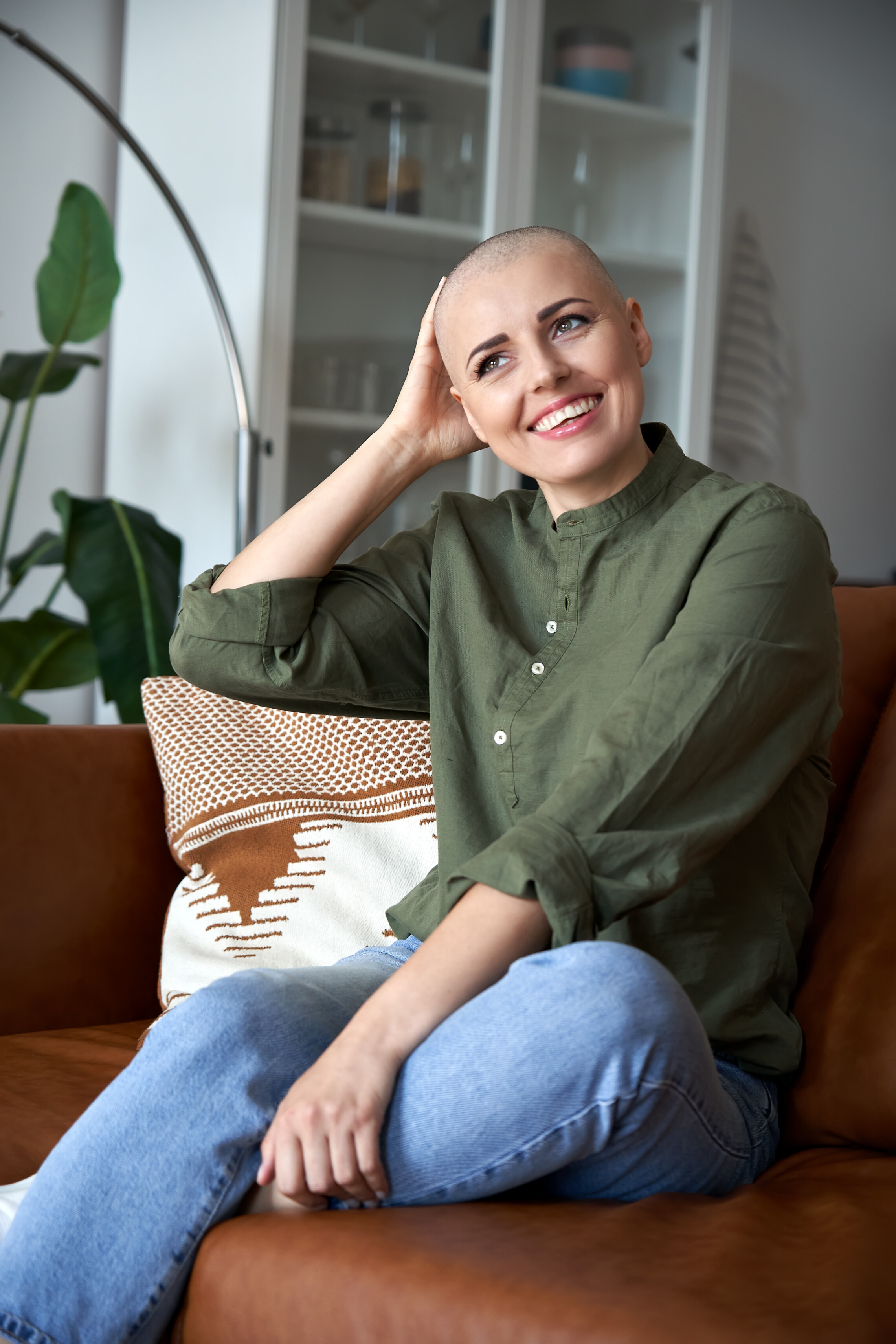 Person sitting on couch smiling